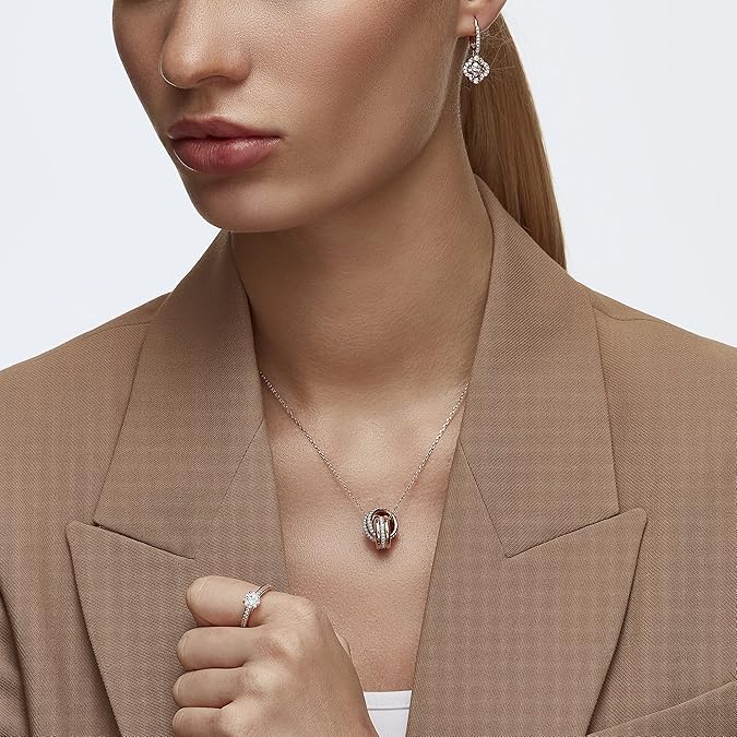 Pierced Earrings with Clear Crystal Pavé Surrounding a Pink Stone on a Rose-Gold